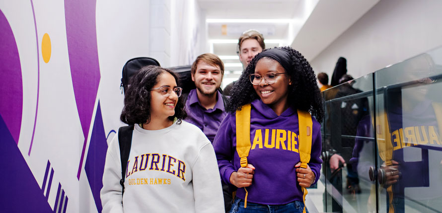 group of students walking in Music hallway
