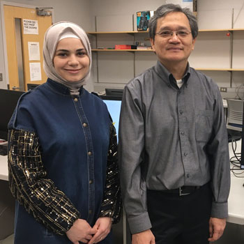 Laurier professor Chính Hoàng supports Syrian student as a former refugee.