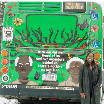 Vanessa Nkansah-Okoree stands with a bus that is wrapped with her artwork.